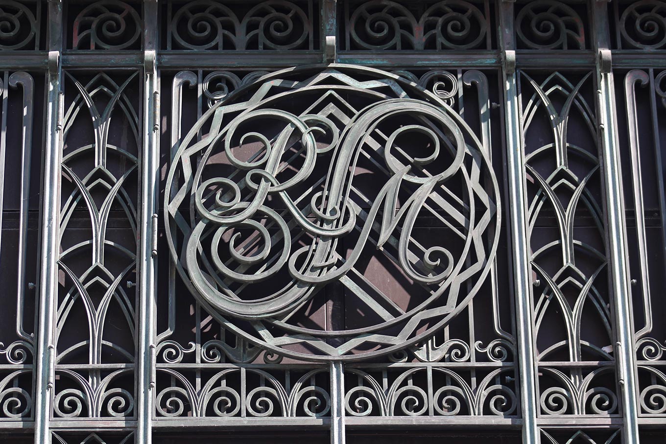 Wrought-iron monogrammed window grill on what was Simpsons Department Store (now Simons) on the rue Ste-Catherine.