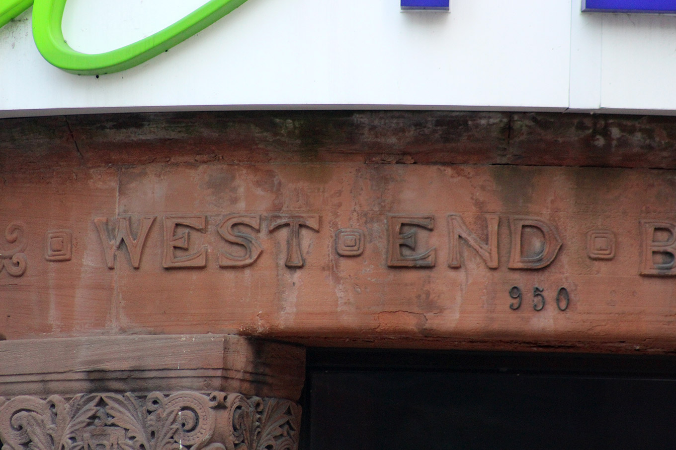Detail of the original West End Branch lettering at the former Bank of Montreal (now Telus).