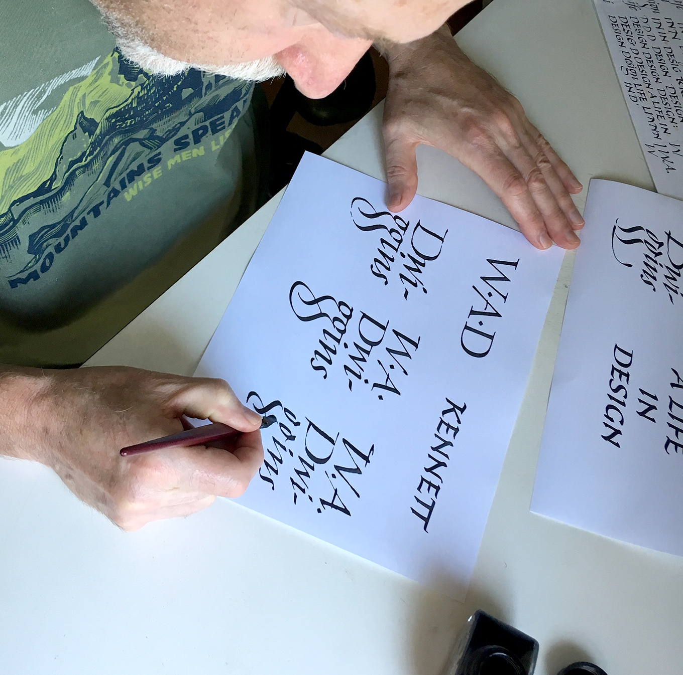 Photograph showing Richard Lipton working on the spine lettering for Bruce Kennett’s forthcoming book on W. A. Dwiggins.